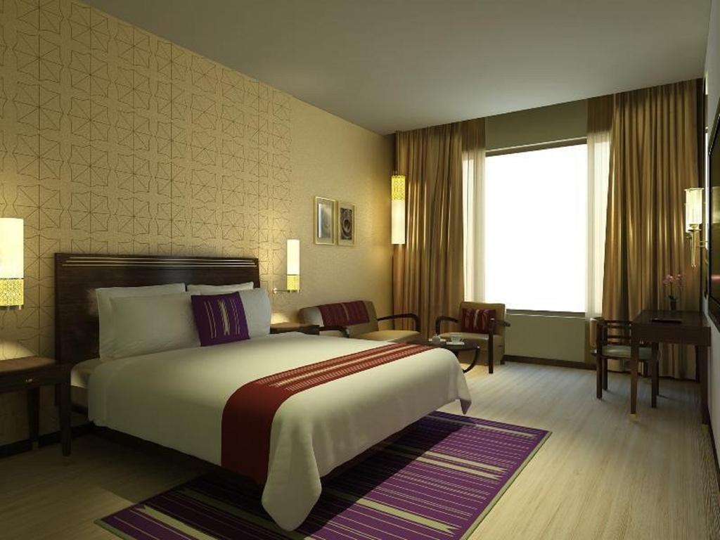 فندق ماراسا ساروفار بريميير تيروباتي المظهر الخارجي الصورة A typical room at the hotel