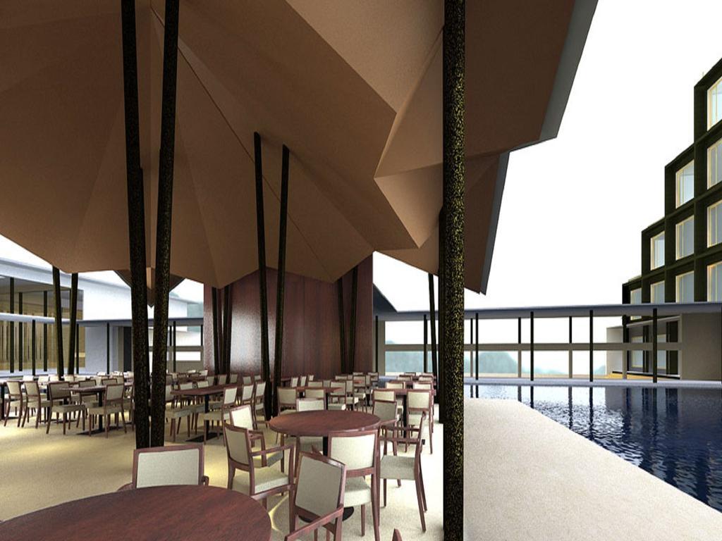 فندق ماراسا ساروفار بريميير تيروباتي المظهر الخارجي الصورة The interior of the restaurant